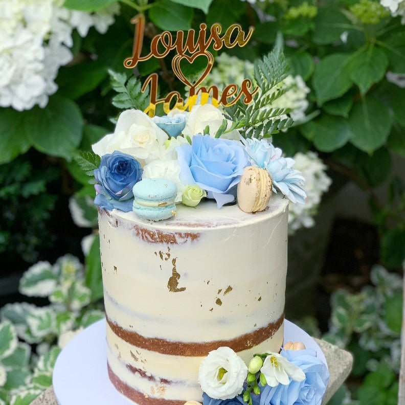 Celebrate your wedding anniversary with this personalised cake topper. Custom designed with names and heart design
