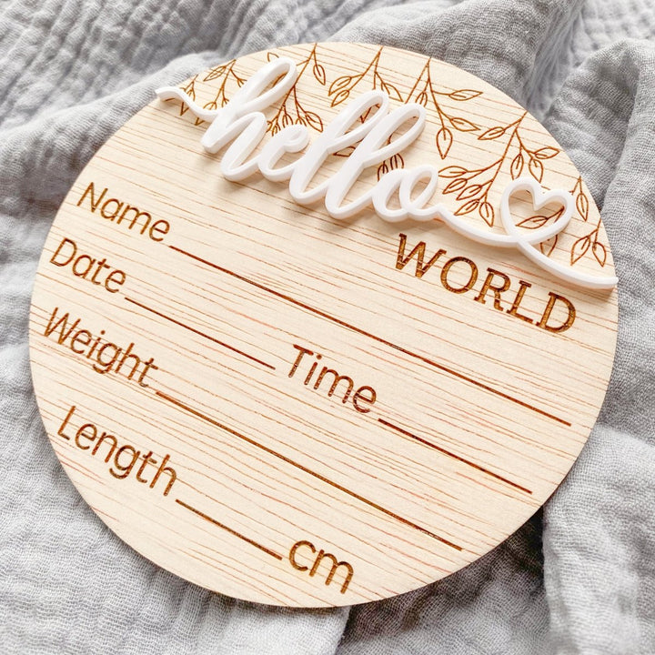 Birth announcement disc for you to write your new baby's name and birth details.  Made from natural wood and white acrylic.