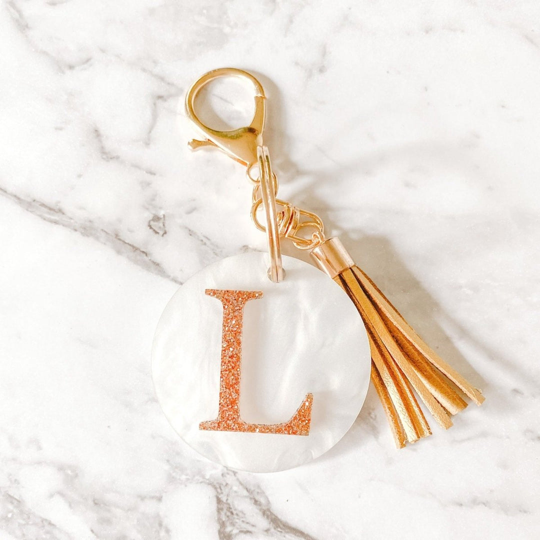 Custom Initial Keyring with tassel.  Pearl acrylic disc, with glitter initial double layer.