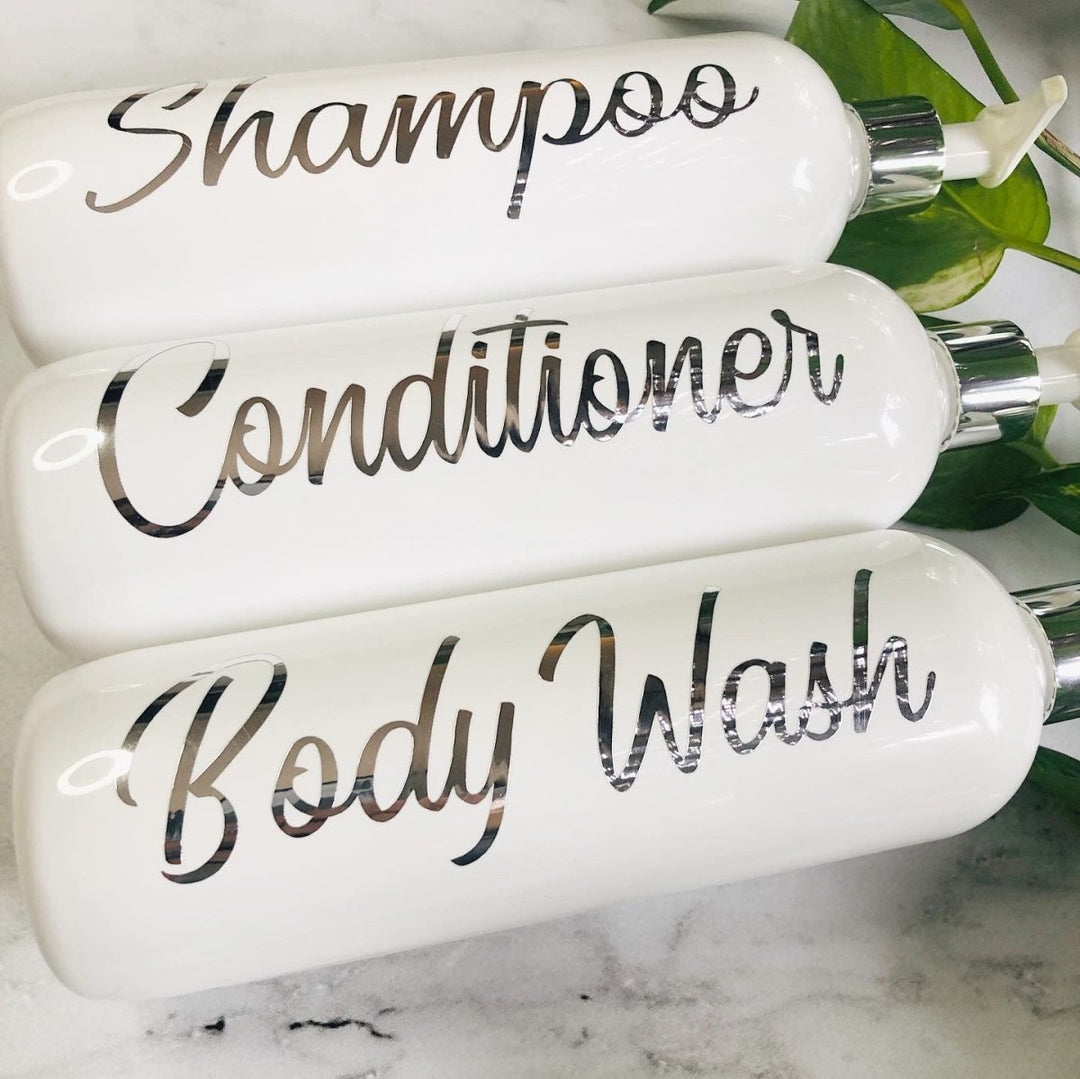shower pump bottles with vinyl personalised decal stickers with customisable wording.