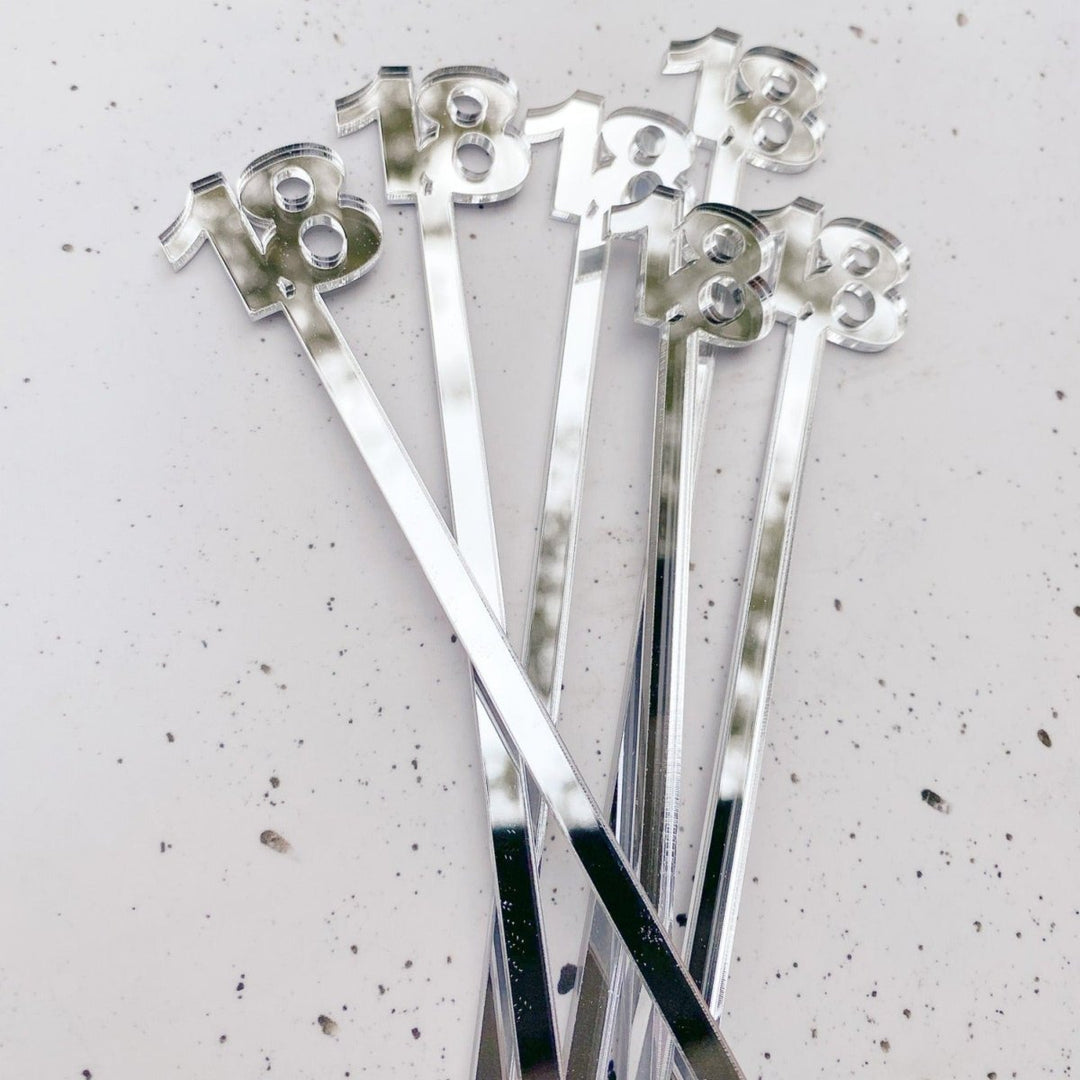 Personalised cocktail sticks for your birthday party.  Personalised drink sticks in a silver mirror acrylic