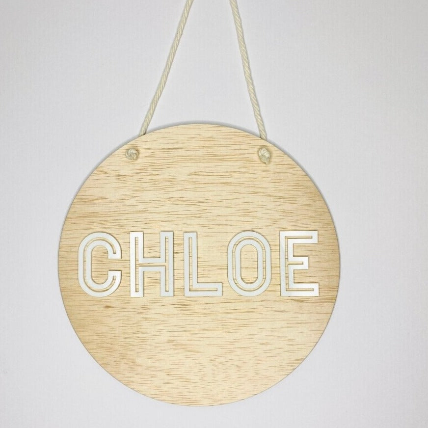 Kids bedroom decor name plaque.  Wooden hanging round, with acrylic name added