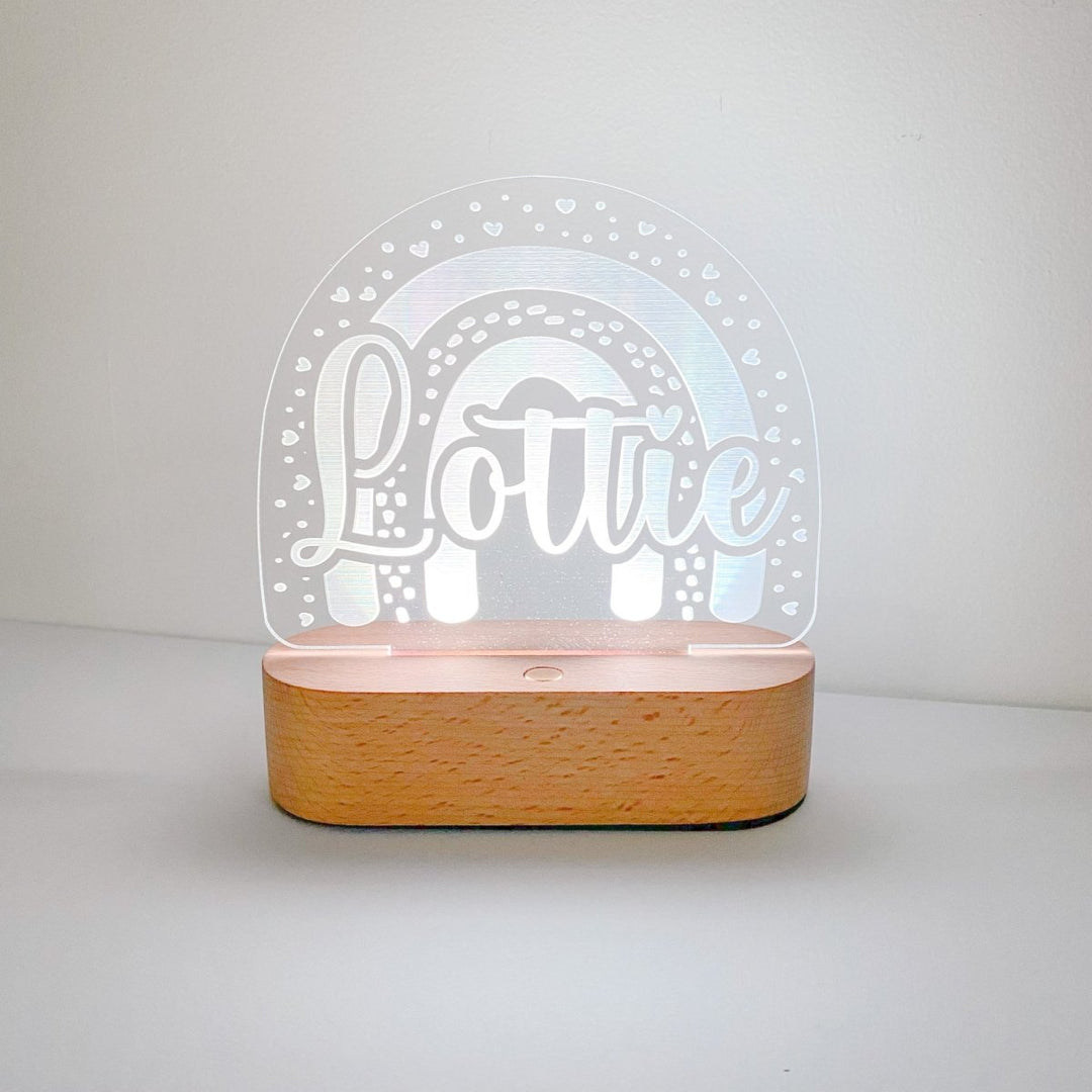 Warm glowing night light for new baby.  With multicoloured LEDs and a bamboo base, is a beautiful addition to nursery decor.