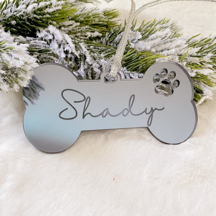 Personalised Christmas Pet Ornament - Dog Bone shape with paw print cut out, engraved with name of dog