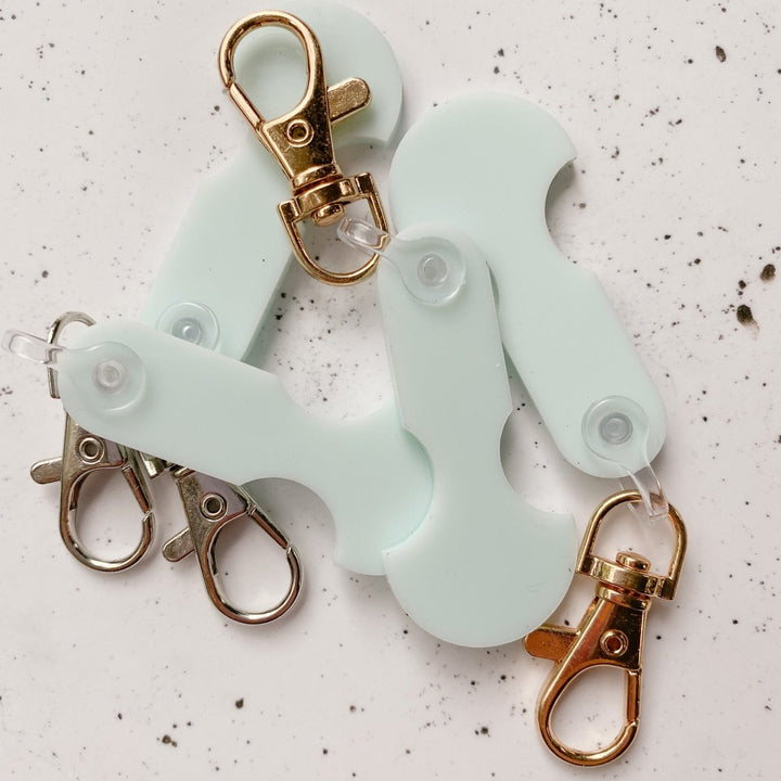 Acrylic one dollar shopping trolley token.  Use instead of gold coin to use trolleys