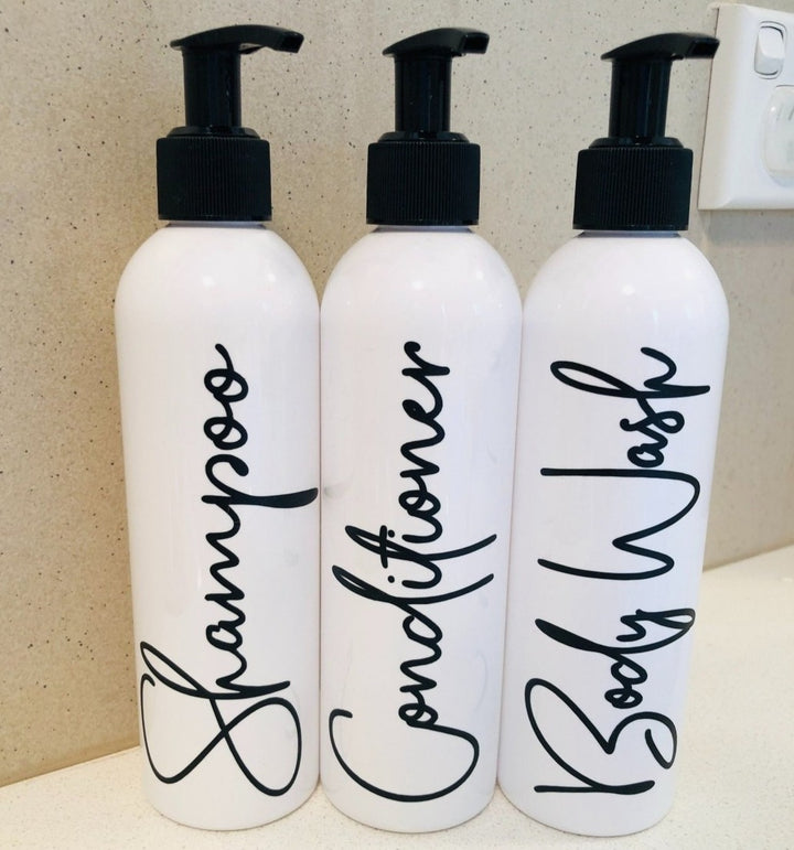 Reusable shampoo dispenser bottles with fully customisable labels - white plastic bottles with black dispensing pump